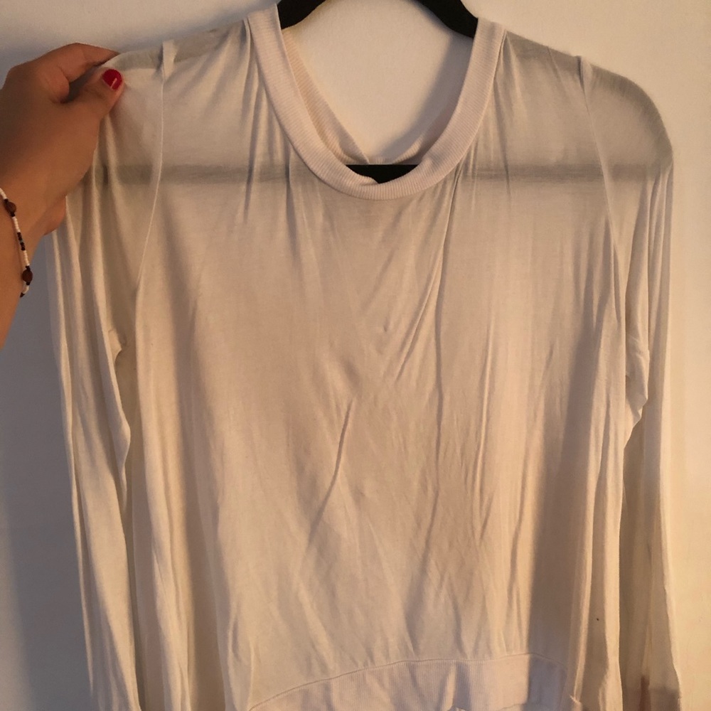 Crew neck white long sleeve. Open back